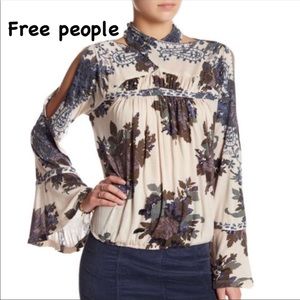 Free people blue top with flared sleeves